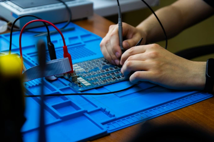Two-way radio being programmed and configured